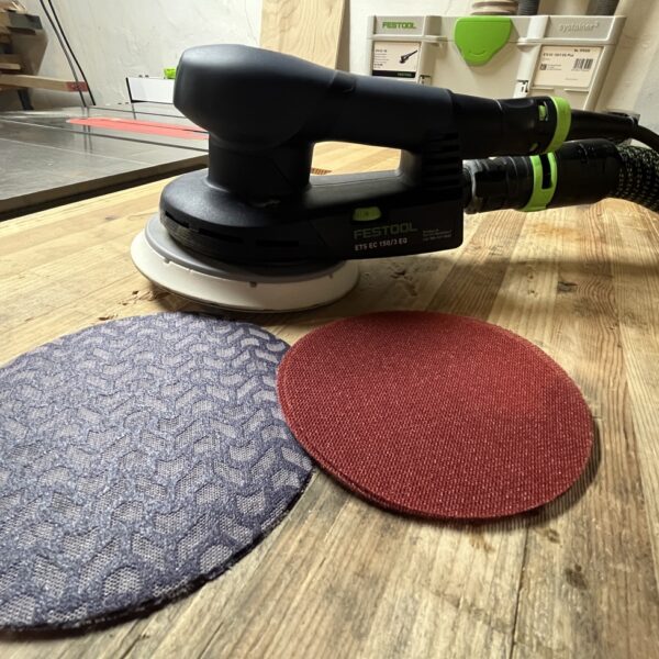 Festool Sander on workbench with 3M Xtract Cubitron II Net and Diablo Sandnet